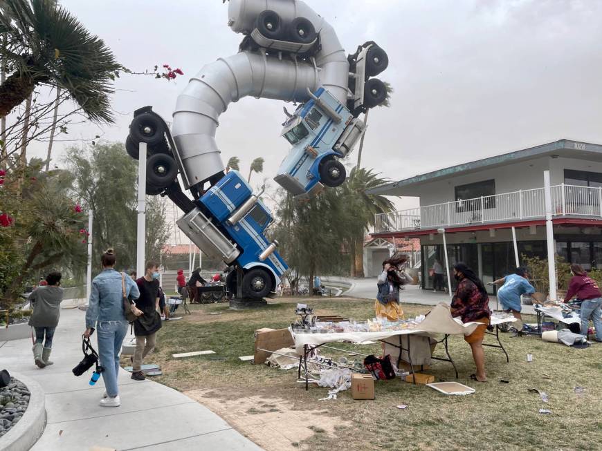 Vendors brace during sudden high winds at Fergusons Downtown in Las Vegas Saturday, Feb. 13, 20 ...