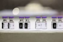 Pfizer vaccine thaws to room temperature at the Cashman Center COVID-19 vaccination site in Las ...