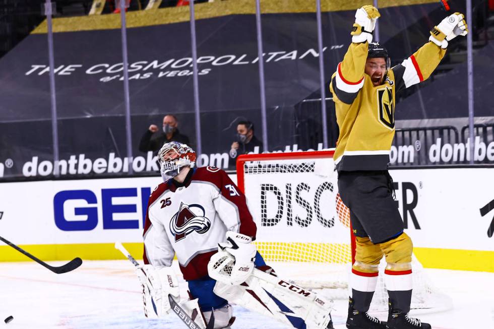 Golden Knights right wing Mark Stone (61) celebrates a goal by Max Pacioretty, not pictured, as ...