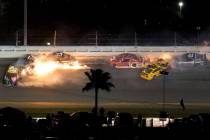 Racers crash during the last lap in the NASCAR Daytona 500 auto race at Daytona International S ...