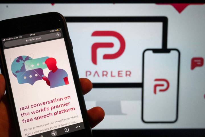 The website of the social media platform Parler is displayed in Berlin. (Christophe Gateau/dpa ...