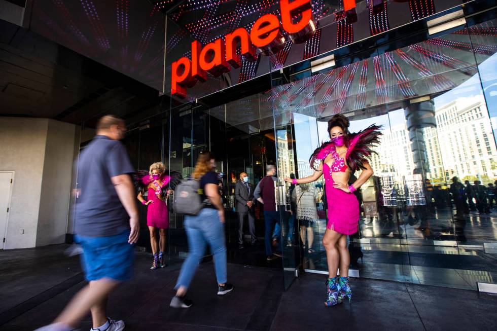 Guests head to the casino at Planet Hollywood Resort in Las Vegas on Thursday, Oct. 8, 2020. ( ...