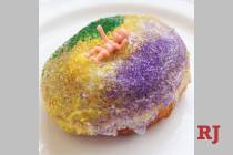 A King Cake doughnut at District Donuts. Sliders. Brew. (District Donuts. Sliders. Brew.)