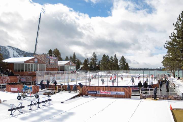 Vegas Golden Knights practice on an outdoor rink built over the 18th fairway of a golf course i ...