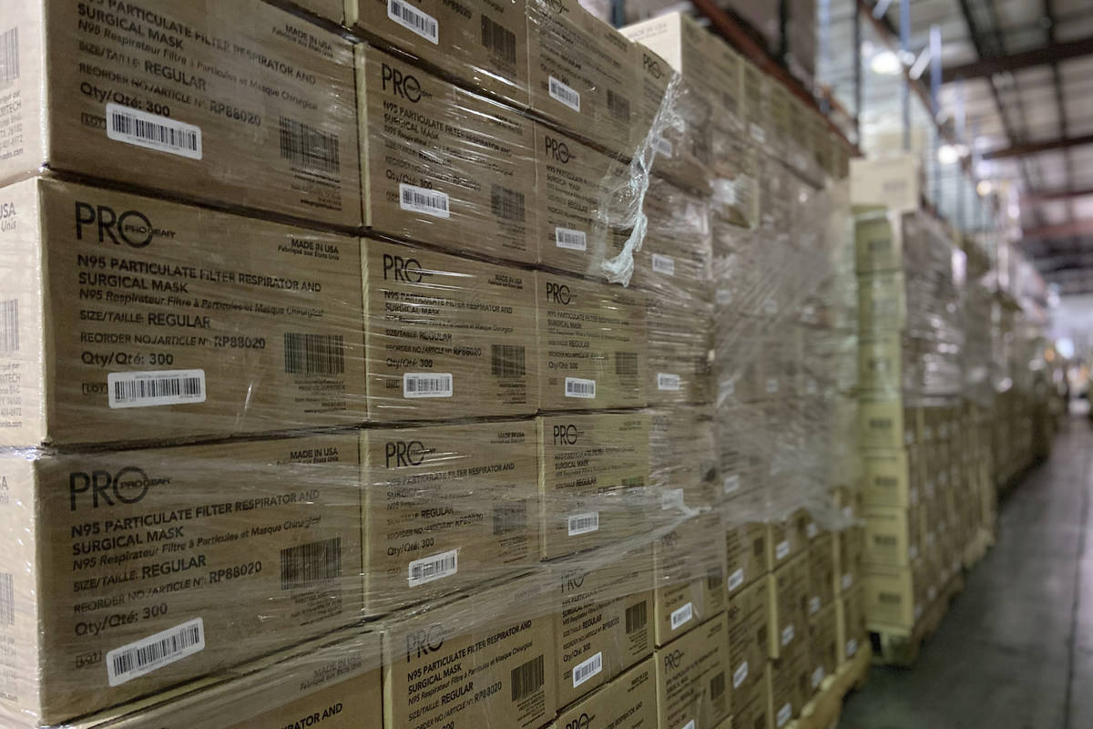 This Friday, Feb. 5, 2021 photo provided by Prestige Ameritech shows boxes of the company's N95 ...