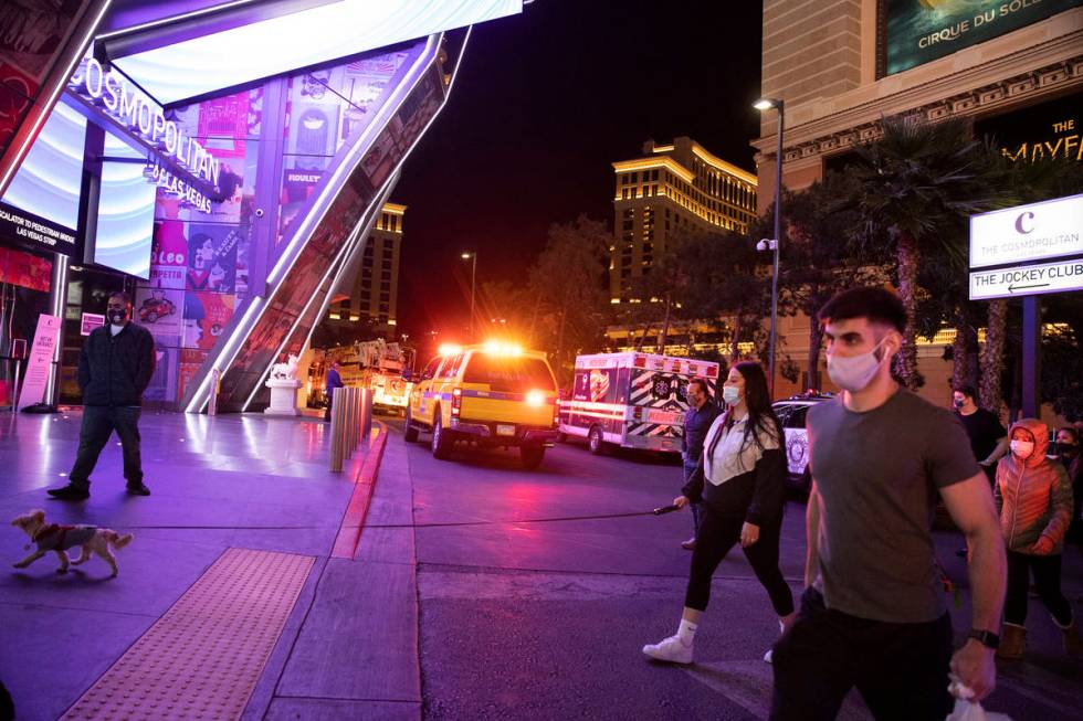 Emergency crews respond to a fire at The Cosmopolitan hotel-casino in Las Vegas, on Saturday, F ...