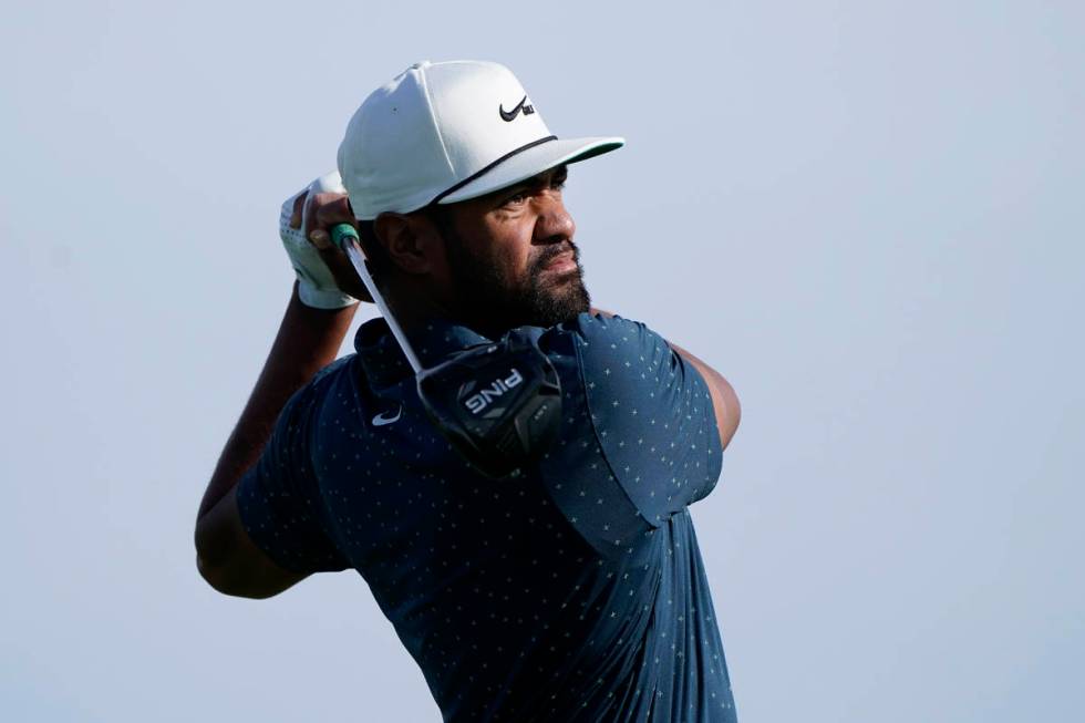 Tony Finau hits from the second tee on the South Course during the final round of the Farmers I ...