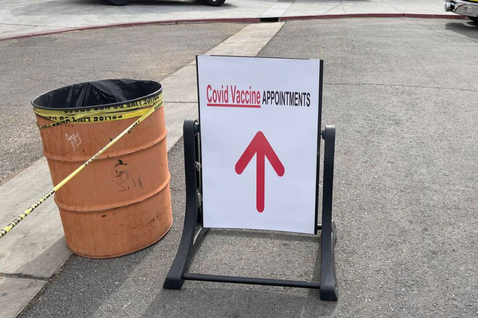 People line up for COVID-19 vaccines at Western High School in Las Vegas Wednesday, Jan. 26, 20 ...