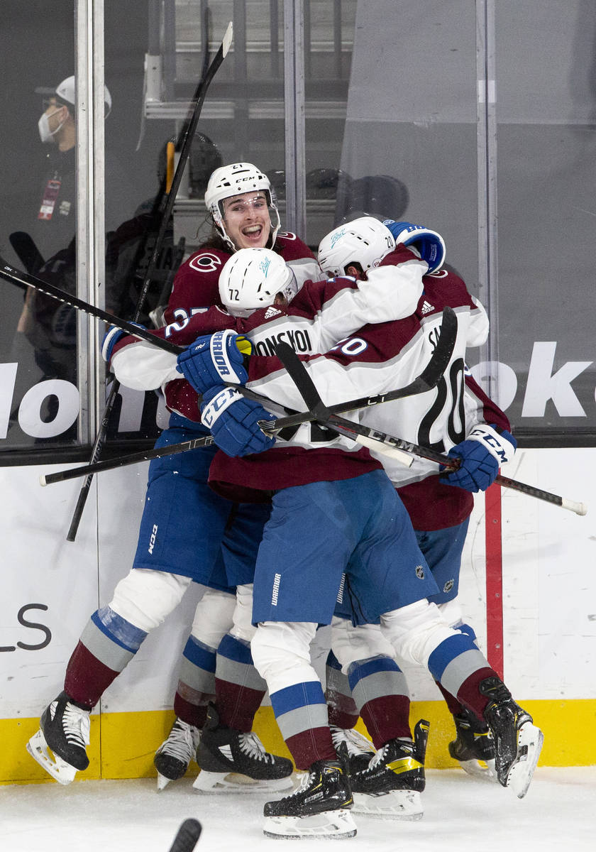 The Colorado Avalanche celebrate a goal scored during the final minute of the third period of t ...