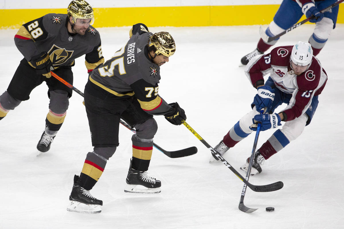 Golden Knights right wing Ryan Reaves (75) and Colorado Avalanche right wing Valeri Nichushkin ...