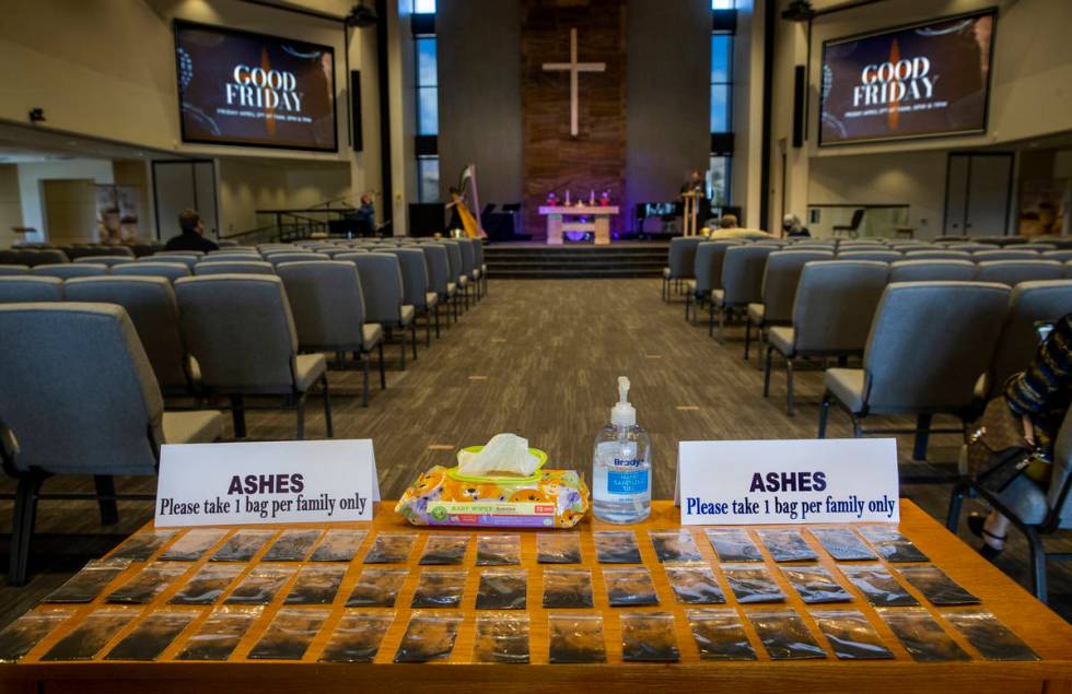 Ashes are placed in individualized bags for worshipers to apply during an Ash Wednesday service ...