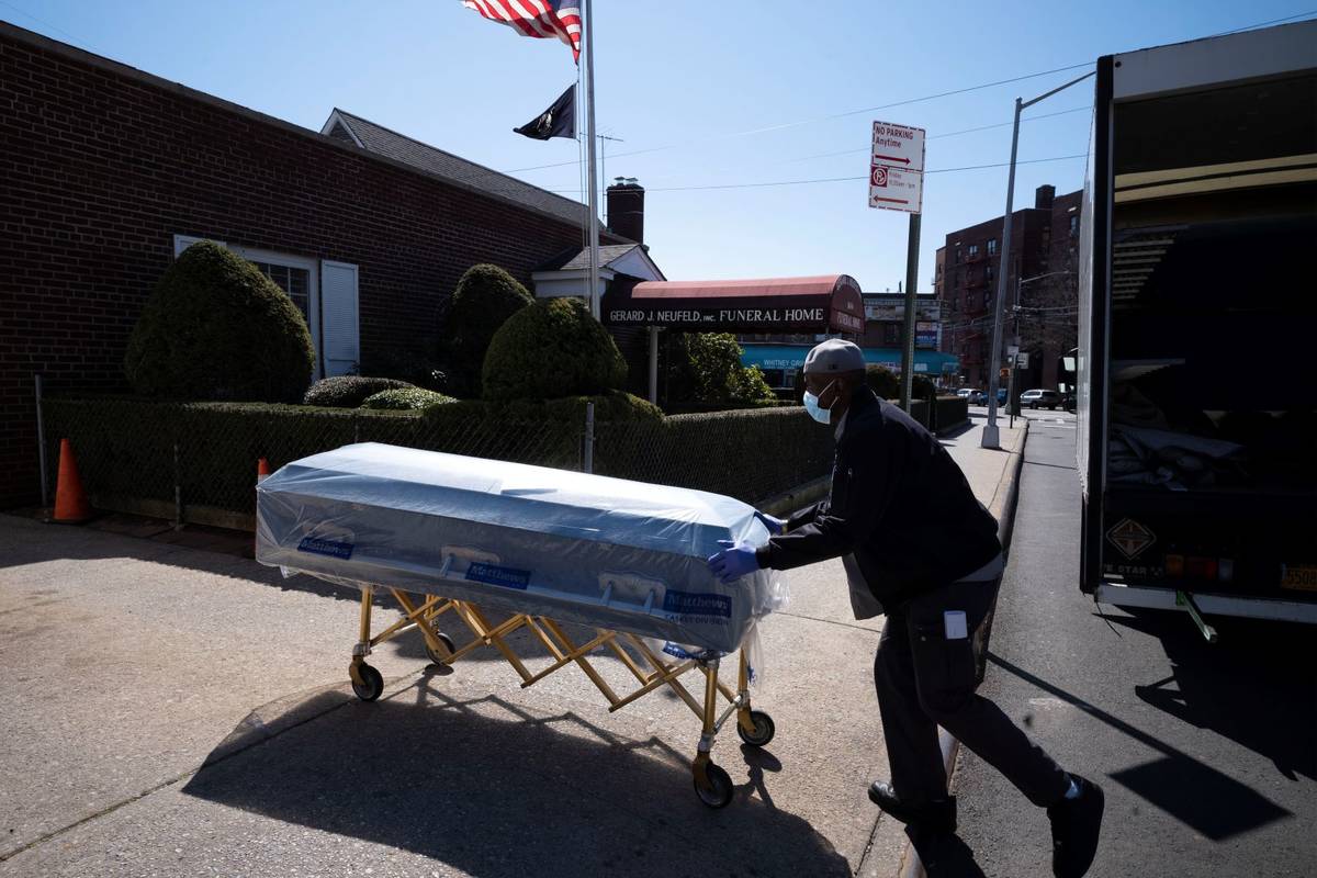William Samuels delivers caskets to the Gerard Neufeld Funeral Home during the coronavirus pand ...