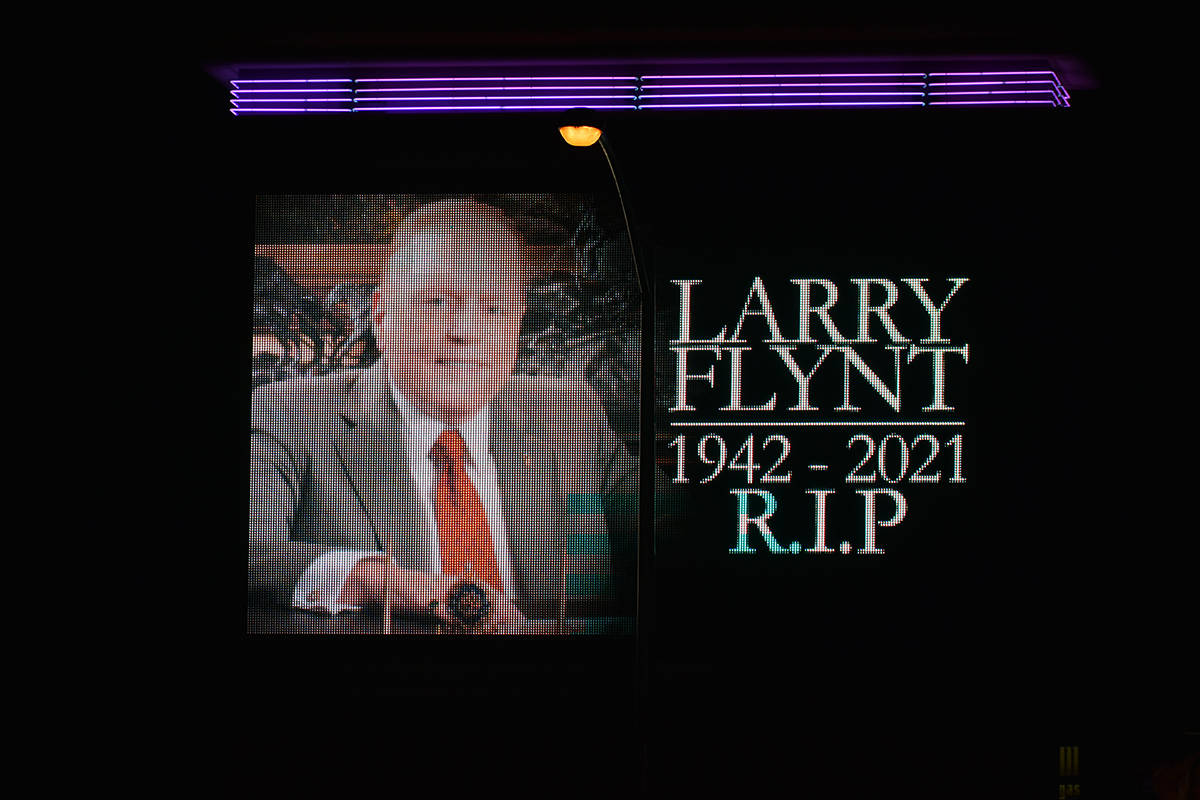 The screen located in the vicinity of the Hustler nightclub pays tribute to Larry Flynt, who re ...