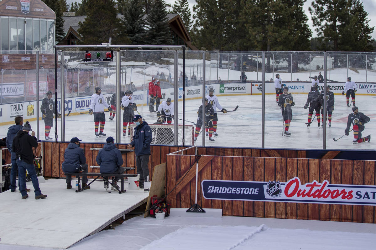 Vegas Golden Knights practice on an outdoor rink built over the 18th fairway of a golf course i ...
