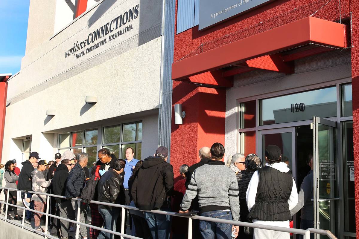 People wait in line at One-Stop Career Center in Las Vegas in March 2020. (Bizuayehu Tesfaye/La ...