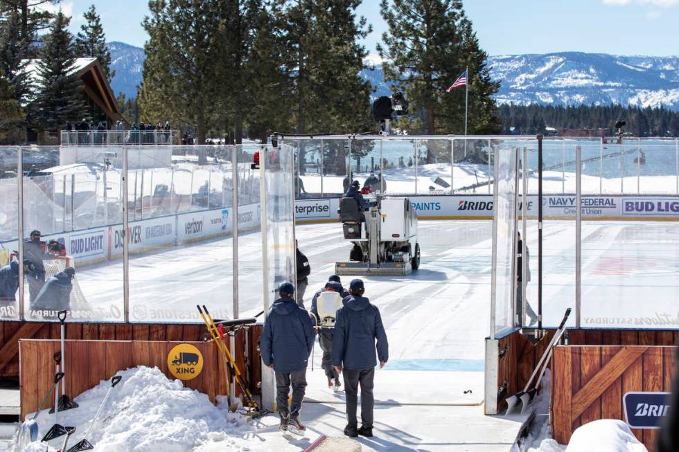 The zamboni cleans the outdoor rink, which was built over the 18th fairway of a golf course, be ...