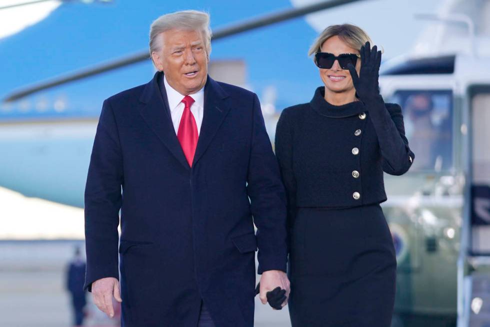 President Donald Trump and first lady Melania Trump arrive on Marine One before boarding Air Fo ...