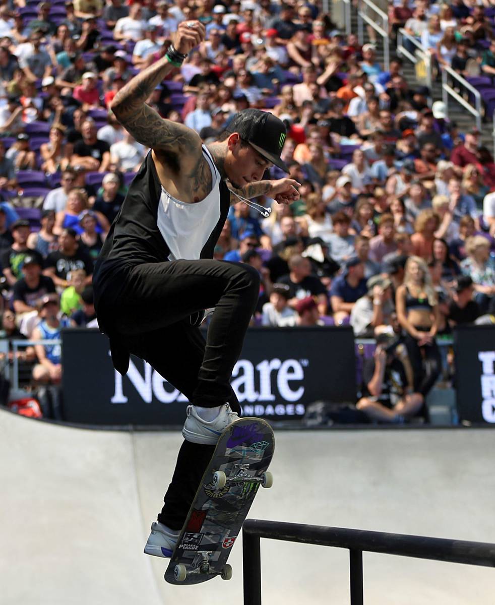 Nyjah Huston pulls off a trick in the men's skateboard street final at the X Games in Minneapol ...