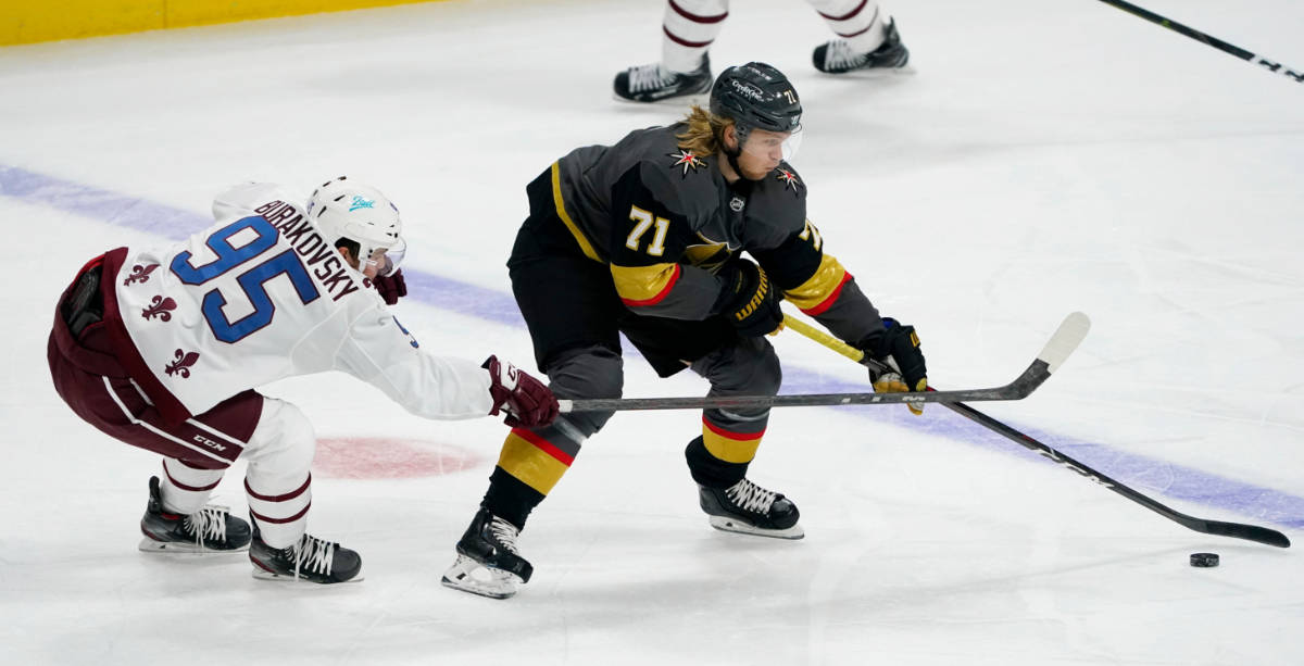 Vegas Golden Knights center William Karlsson, right, reaches out to control the puck as Colorad ...