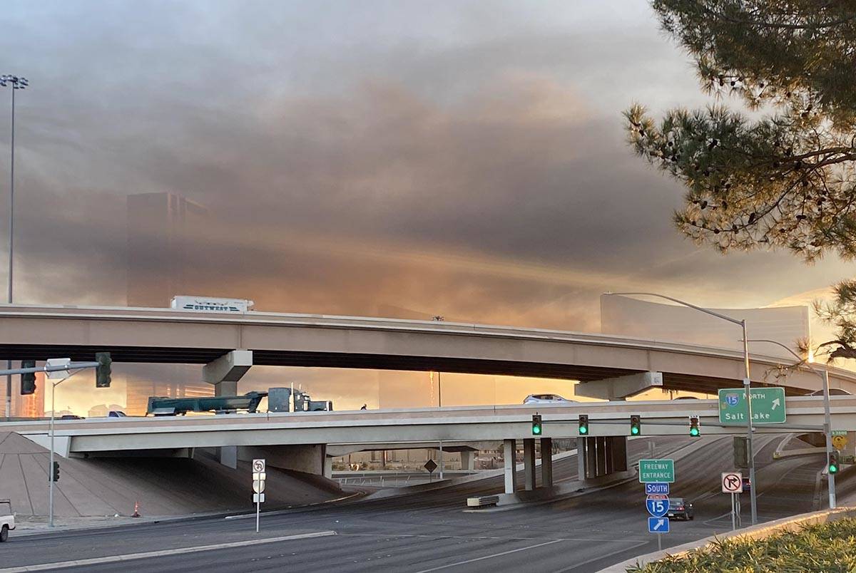 Smoke fills much of the sky near Interstate 15 and Flamingo Road early Tuesday, Feb. 23, 2021. ...