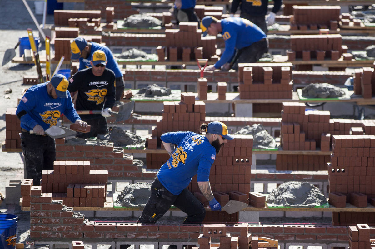 Mario Alves, middle, from Hamilton, Ontario competes in the Spec Mix Bricklayer 500 during day ...