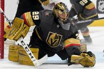 Vegas Golden Knights goaltender Marc-Andre Fleury makes a glove save of a shot against the Colo ...