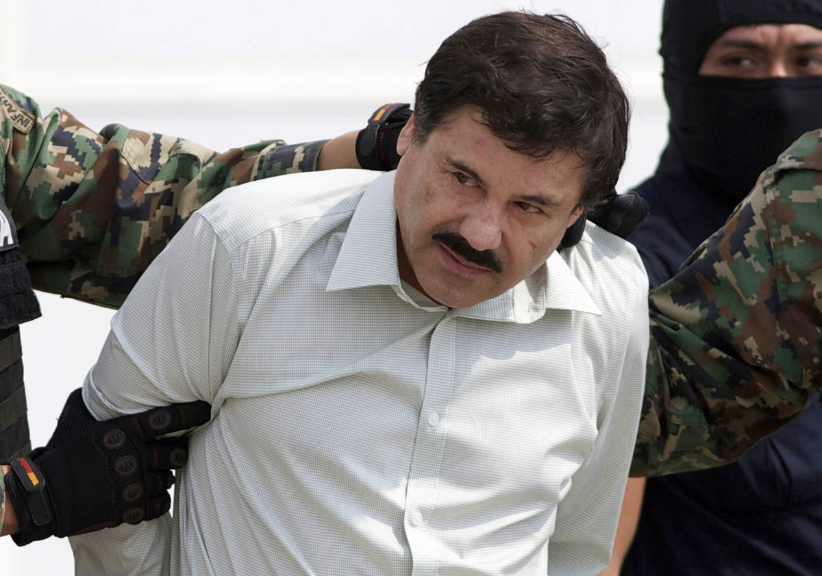FILE - In this Feb. 22, 2014 file photo, Joaquin "El Chapo" Guzman, the head of Mexic ...