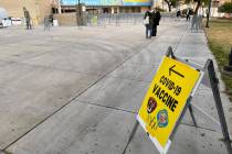 People arrive for COVID-19 vaccines at Cashman Center in Las Vegas Wednesday, Jan. 26, 2021. (K ...