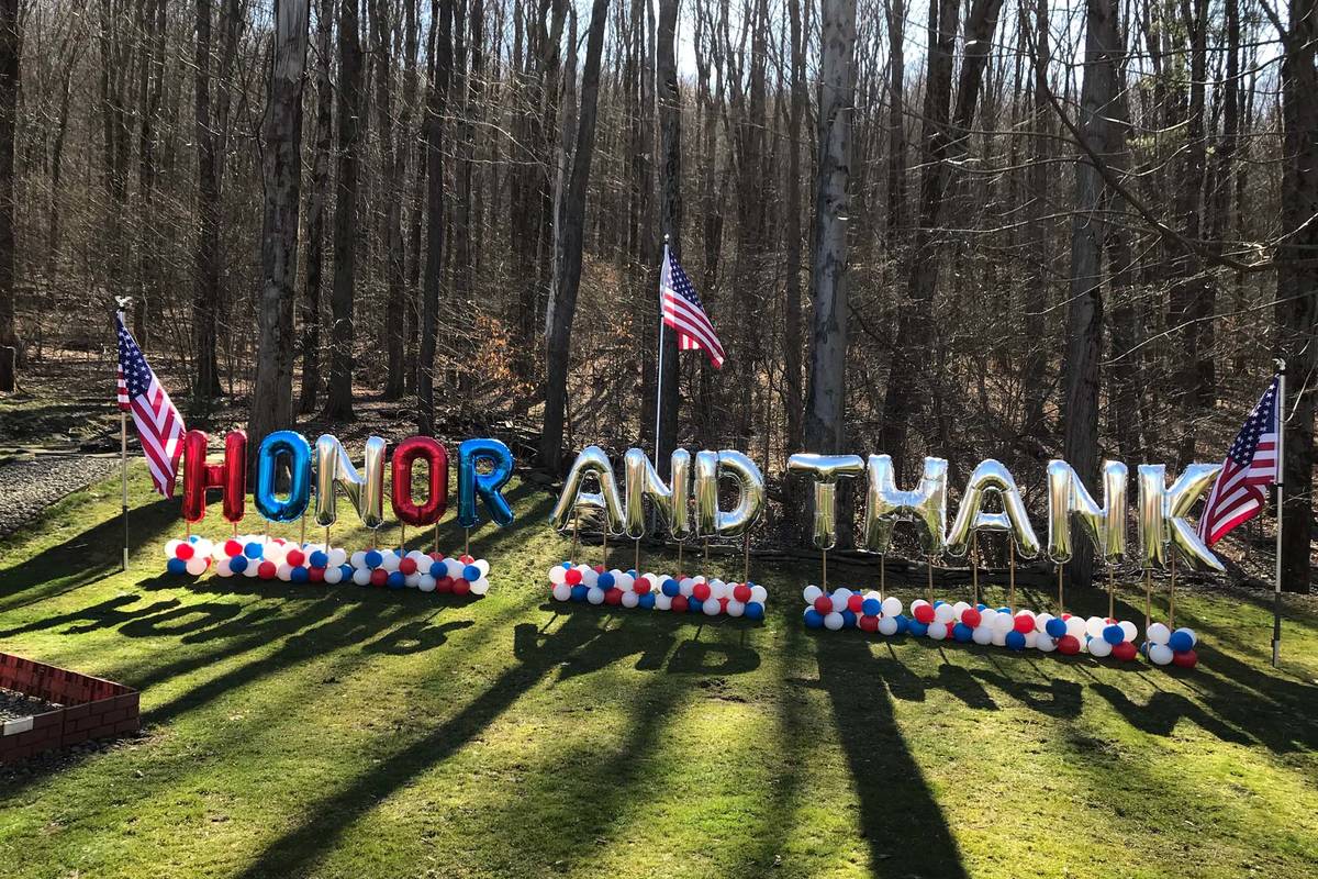 An Honor and Thank balloon setup. The initiative provides a way for people to thank healthcare ...