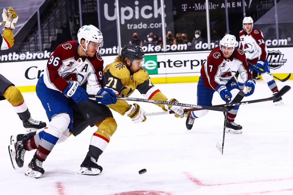 Colorado Avalanche right wing Mikko Rantanen (96) and Golden Knights center William Karlsson (7 ...