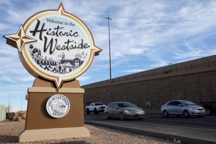 Traffic moves past the newly placed "Welcome to the Historic Westside" sign off of US95 and Mar ...