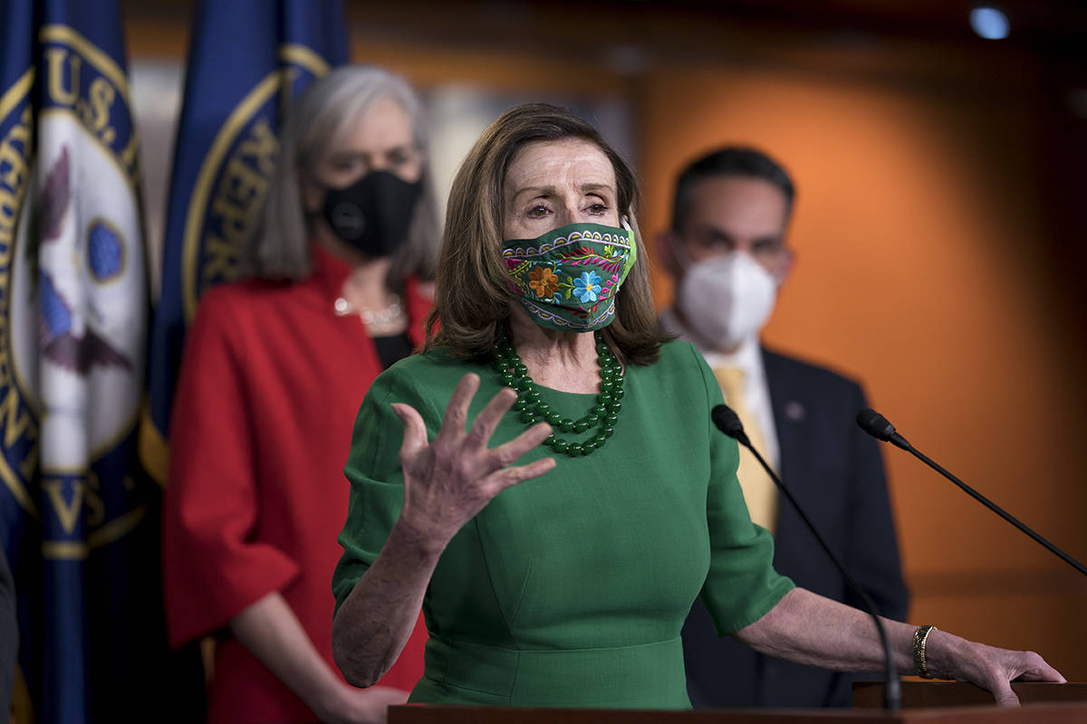 Speaker of the House Nancy Pelosi, D-Calif., meets with reporters before the House votes to pas ...