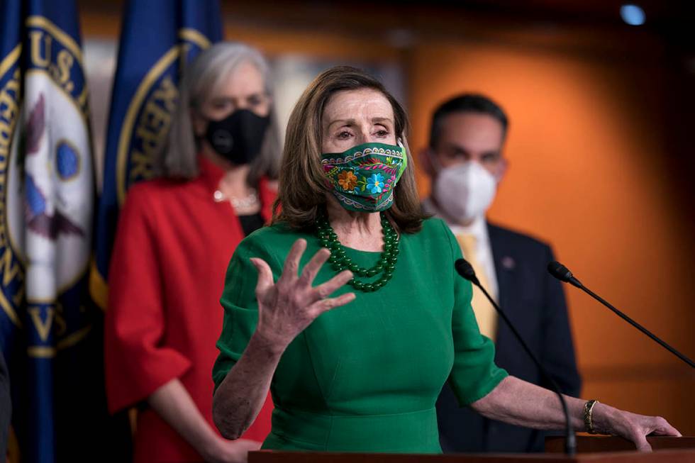 Speaker of the House Nancy Pelosi, D-Calif., meets with reporters before the House votes to pas ...