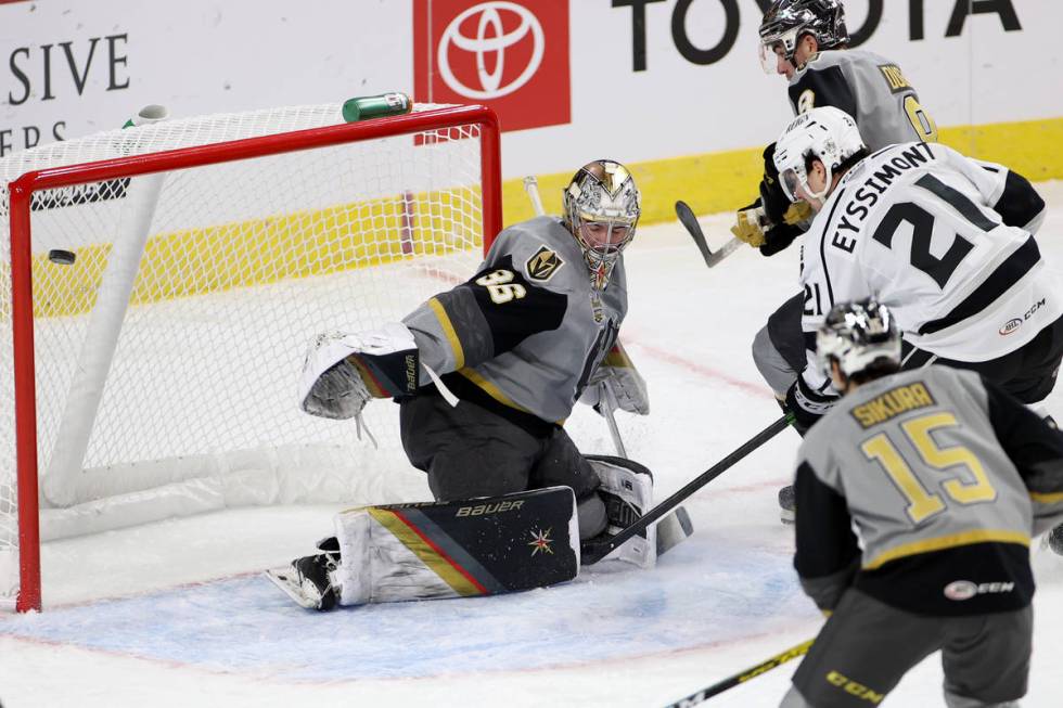 A shot bounces off the goal bar as Henderson Silver Knights goaltender Logan Thompson (36) atte ...