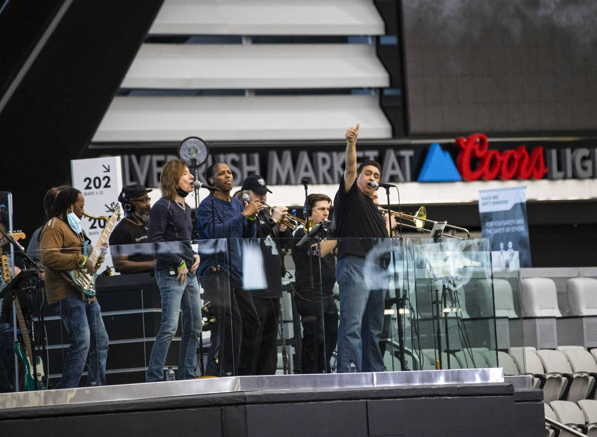 Members of Santa Fe & The Fat City Horns perform during soundcheck at Allegiant Stadium in ...