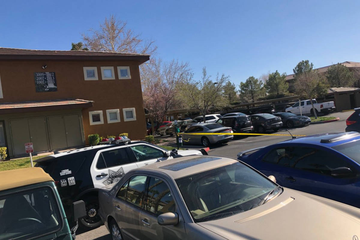 Police conduct a homicide investigation Saturday, Feb. 27, 2021, on the 1300 block of North Tow ...