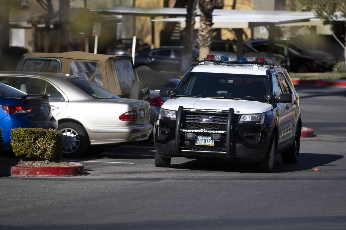 Las Vegas police investigate an apparent murder-suicide inside an apartment at the Falling Wate ...
