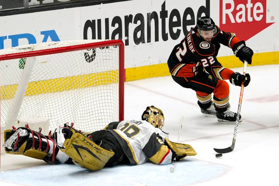 Anaheim Ducks defenseman Kevin Shattenkirk, right, tries to get a shot past Vegas Golden Knight ...