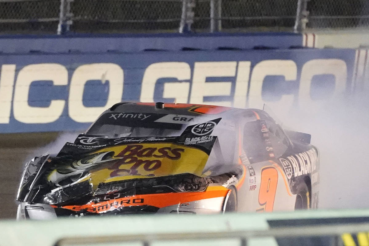 Race leader Noah Gragson (9) limps along the track after having made contact with David Starr w ...