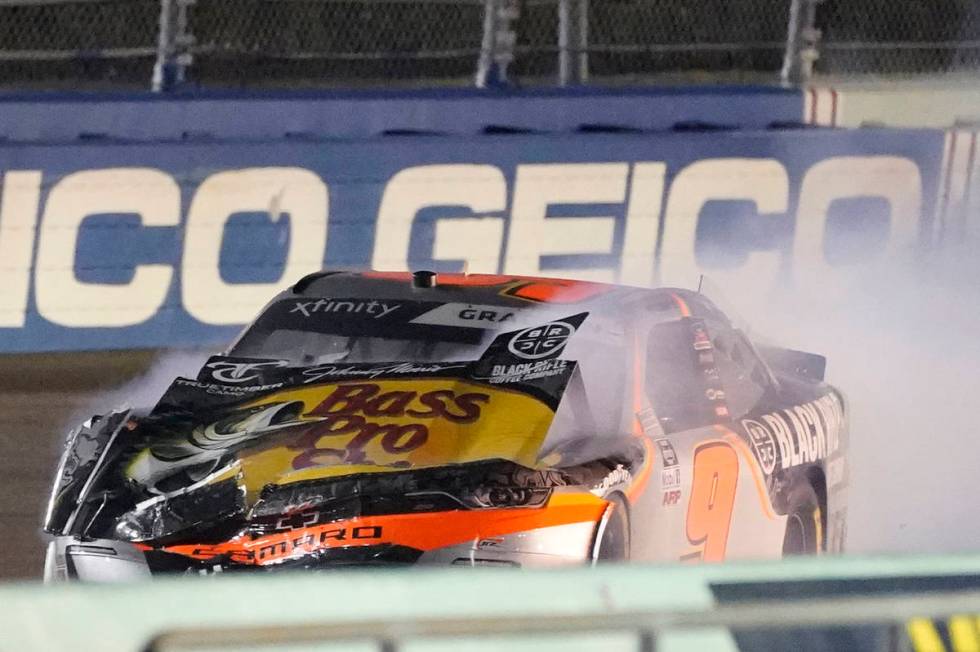 Race leader Noah Gragson (9) limps along the track after having made contact with David Starr w ...