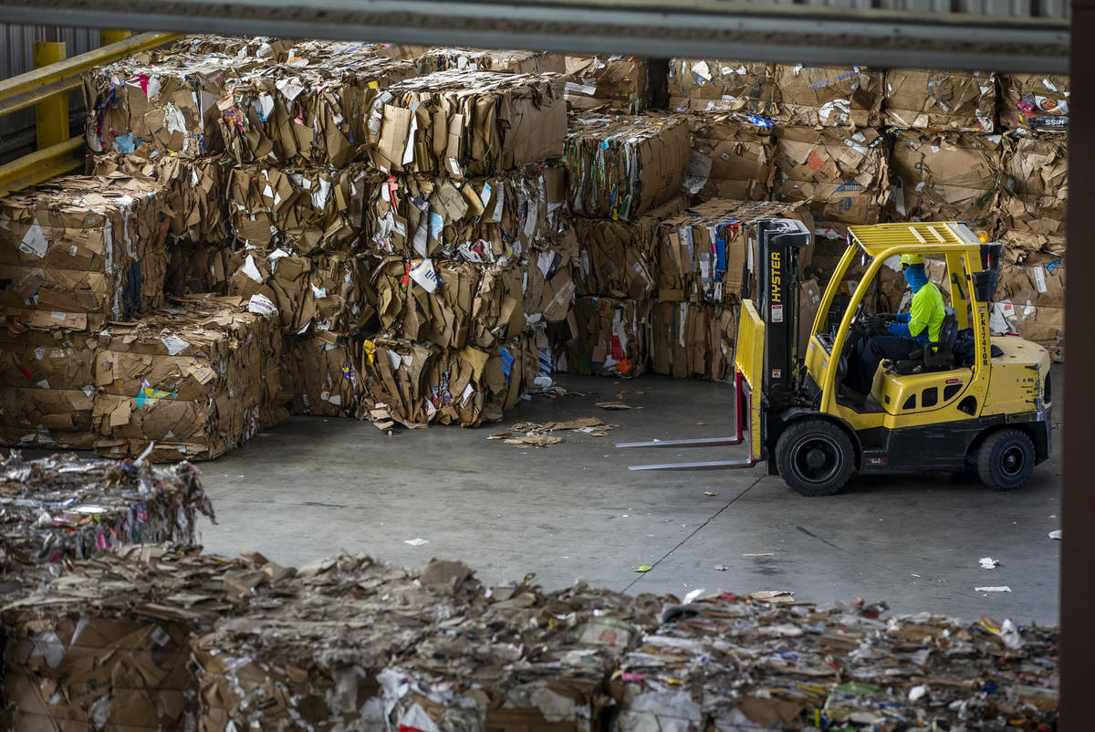Baled cardboard is stacked for shipping at the Republic Services recycling center on Jan. 15, 2 ...