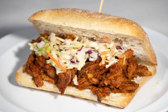 The pulled NoPork sandwich is served with house-made barbecue sauce and maple-mustard coleslaw. ...