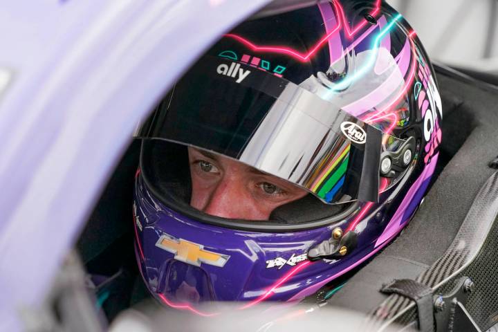 Pole sitter Alex Bowman waits in his car before the start of the NASCAR Daytona 500 auto race a ...