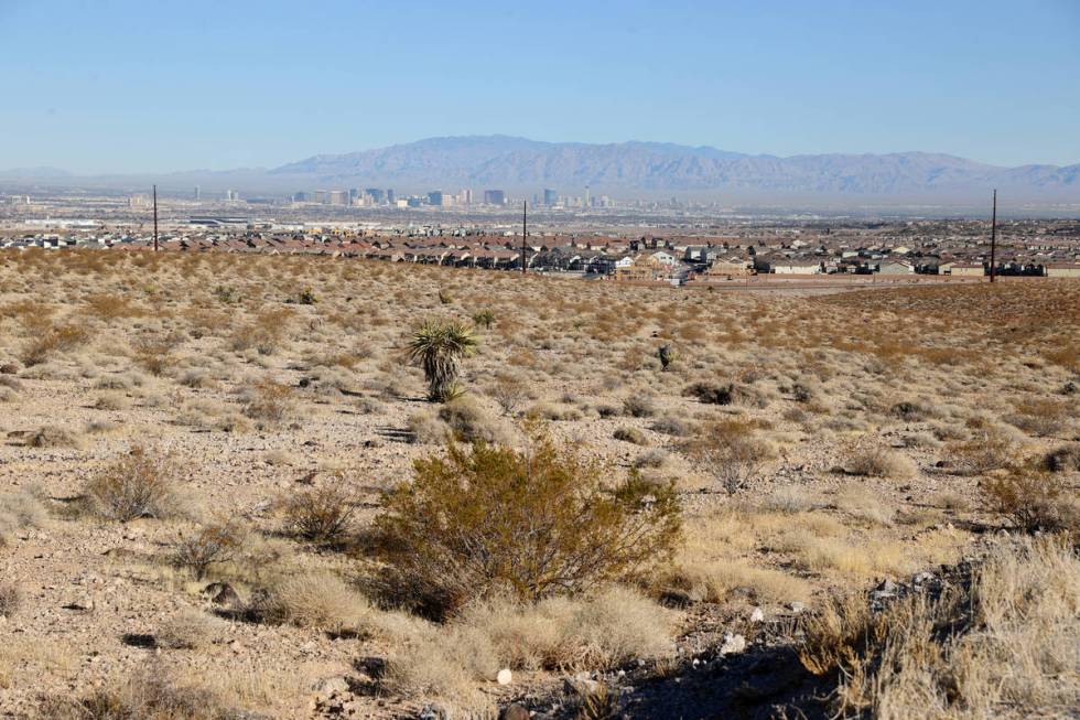 Henderson and the Strip are seen from the Visitor Contact Station parking lot at Sloan Canyon N ...