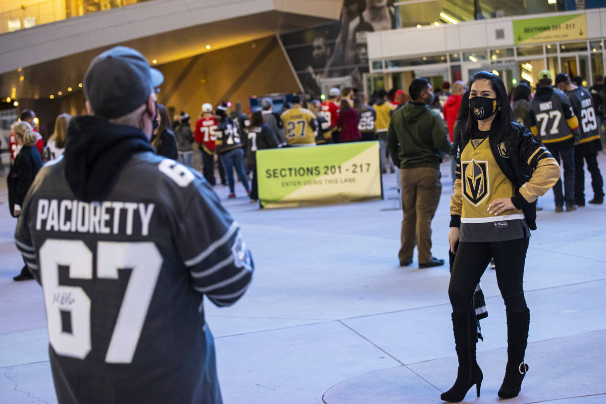 Gladys Peltzer, of Las Vegas, poses for a photo as fans arrive for the first Golden Knights gam ...