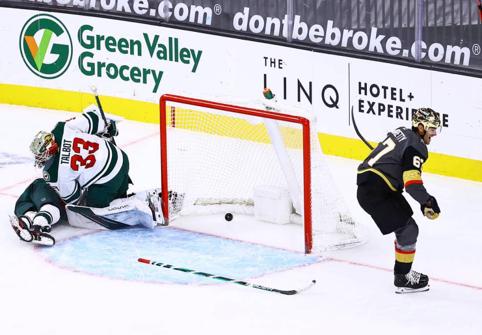 Golden Knights left wing Max Pacioretty (67) scores a goal in overtime past Minnesota Wild goal ...