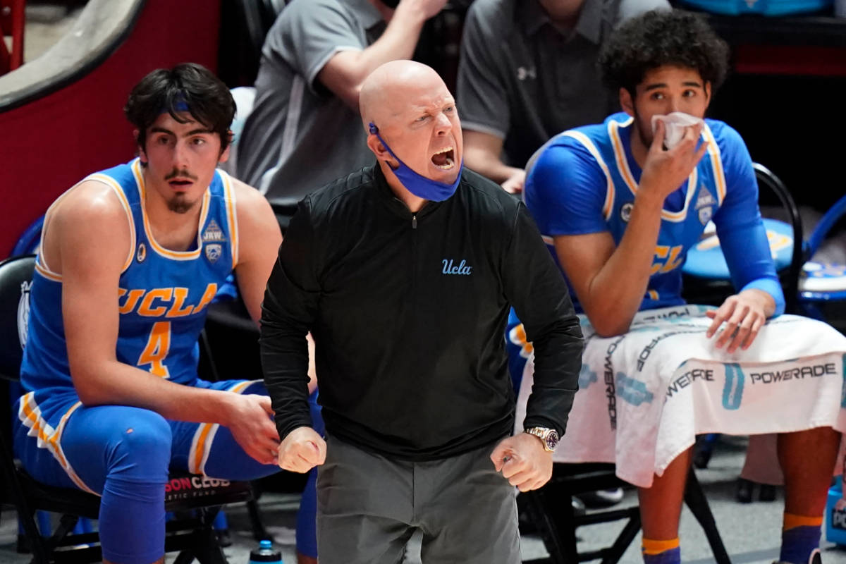 UCLA coach Mick Cronin shouts to the team during the first half of an NCAA college basketball g ...