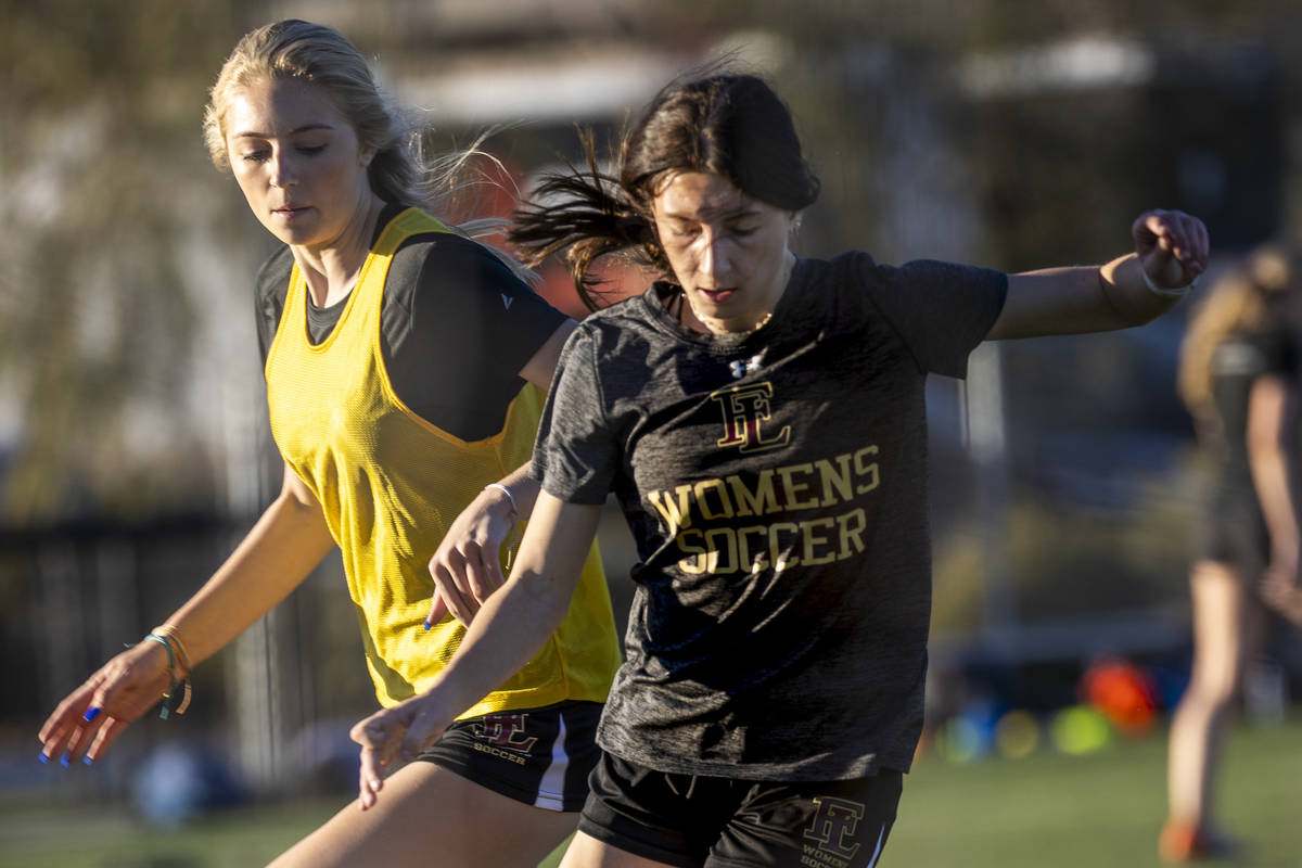 Player Camille Lomgabardi, front, drives the ball past a teammate during girlÕs soccer tea ...