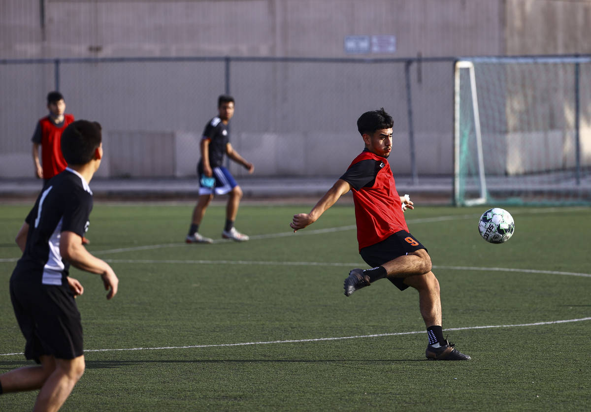 Equipo Academy's John Gandarilla looks to kick the ball during soccer practice at Mike Morgan P ...