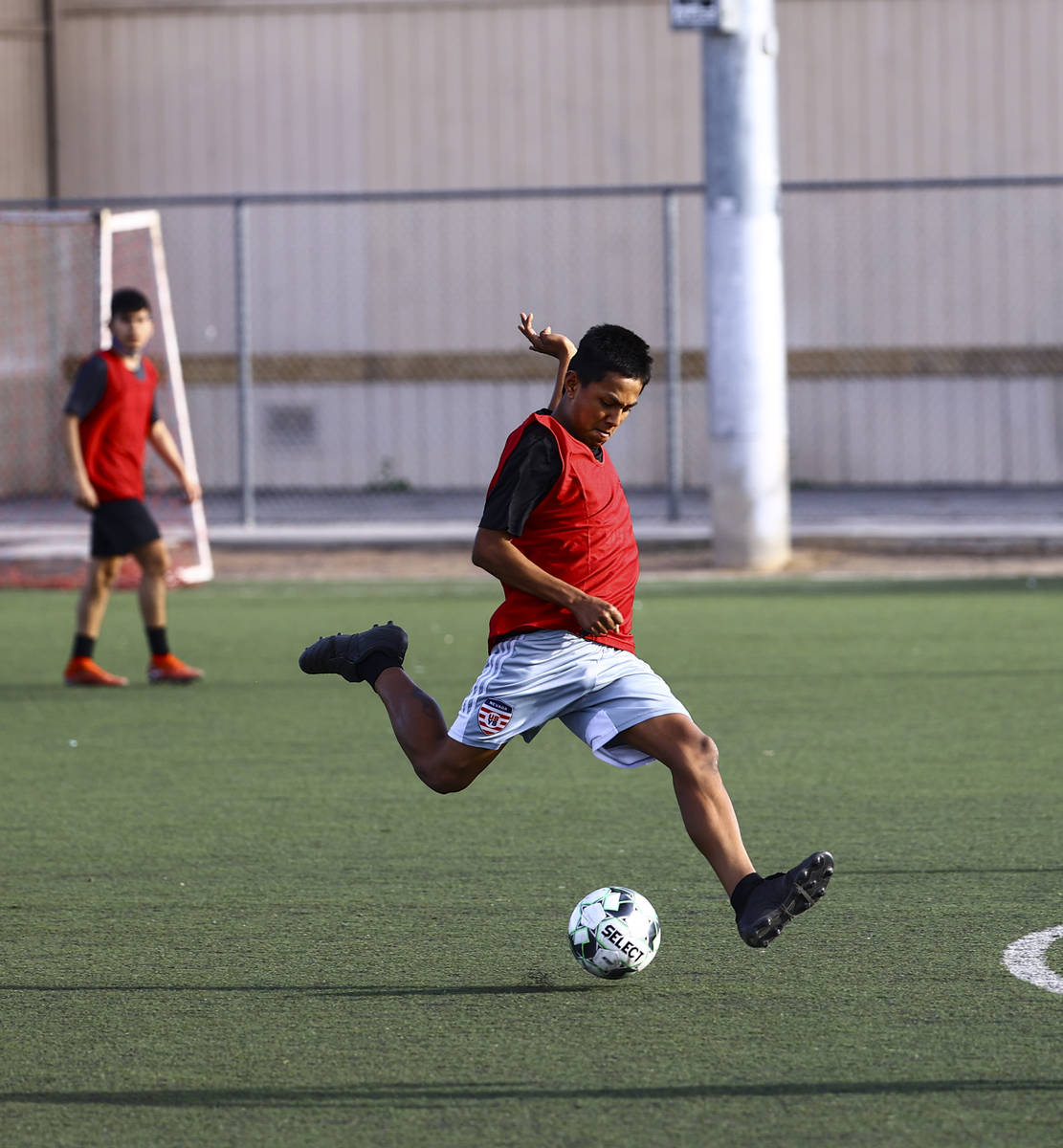 Equipo Academy's Orlando Zurita kicks the ball during soccer practice at Mike Morgan Park in La ...